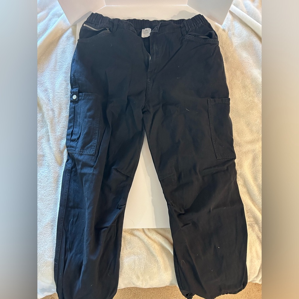 Black cargo style pants.